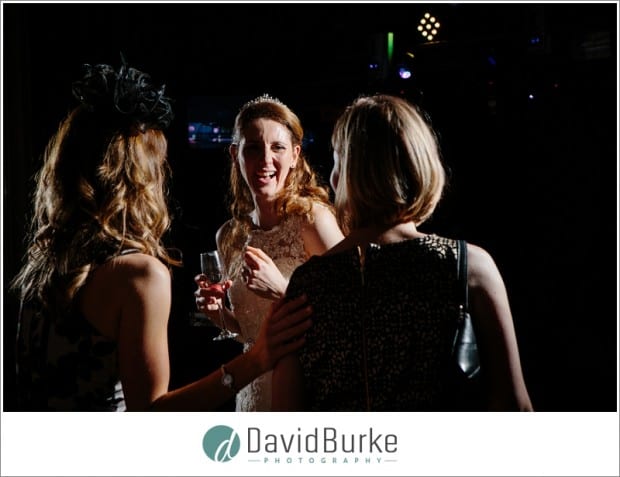 bride laughing on dancefloor