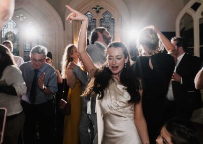 happy dancing bride at chiddingstone castle