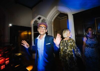 dancing wedding guest at chiddingstone castle