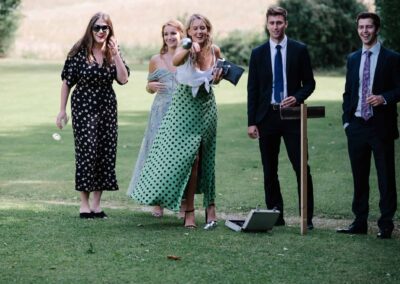 wedding guests playing games at chiddingstone castle